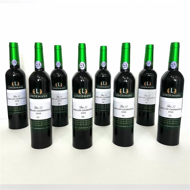 Multiplying Wine Bottles Green by Tora Magic (4948-G1)